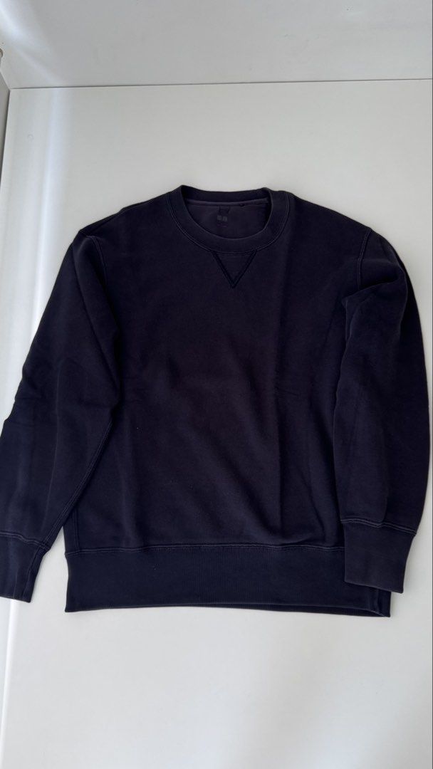 Uniqlo Navy Crewneck Sweatshirt (Category: Coats, Jackets and Outerwear) located in Manila. Submitted by vdoozy (Listing ID 1468528693, Image 1). Description: Uniqlo Crewneck Sweatshirt Size: Medium Color: Navy Dimensions: - Length 25 inches - Width 18 inches - Shoulder Width 18 inches - Arm Sleeve 22.5 inches Location: Katipunan, Quezon City.