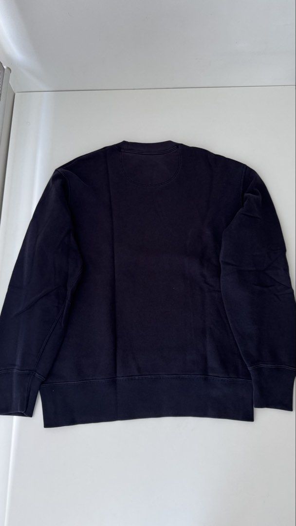 Uniqlo Navy Crewneck Sweatshirt (Category: Coats, Jackets and Outerwear) located in Manila. Submitted by vdoozy (Listing ID 1468528693, Image 2). Description: Uniqlo Crewneck Sweatshirt Size: Medium Color: Navy Dimensions: - Length 25 inches - Width 18 inches - Shoulder Width 18 inches - Arm Sleeve 22.5 inches Location: Katipunan, Quezon City.