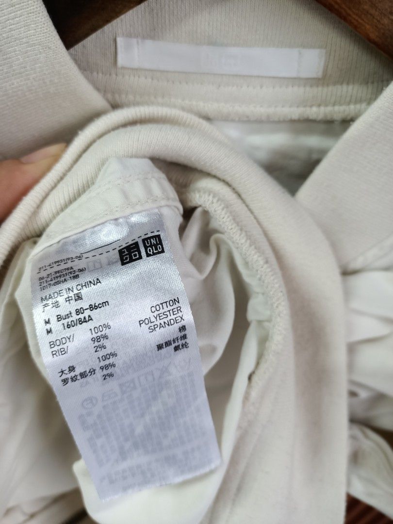Uniqlo Off-White Bomber Jacket Size M (Category: Coats, Jackets and Outerwear) located in Bayombong. Submitted by rheaaa00530 (Listing ID 1468625599, Image 2). Description: - Brand: Uniqlo - Color: Off-white - Size: M (fits bust 80-86cm) - Material: 100% cotton outer body; ribbing made of 98% polyester and 2% spandex - Design: Zip-up front with side pockets, plus ribbed collar, cuffs, and hem - Style: Clean look, easy to match with daily outfits 