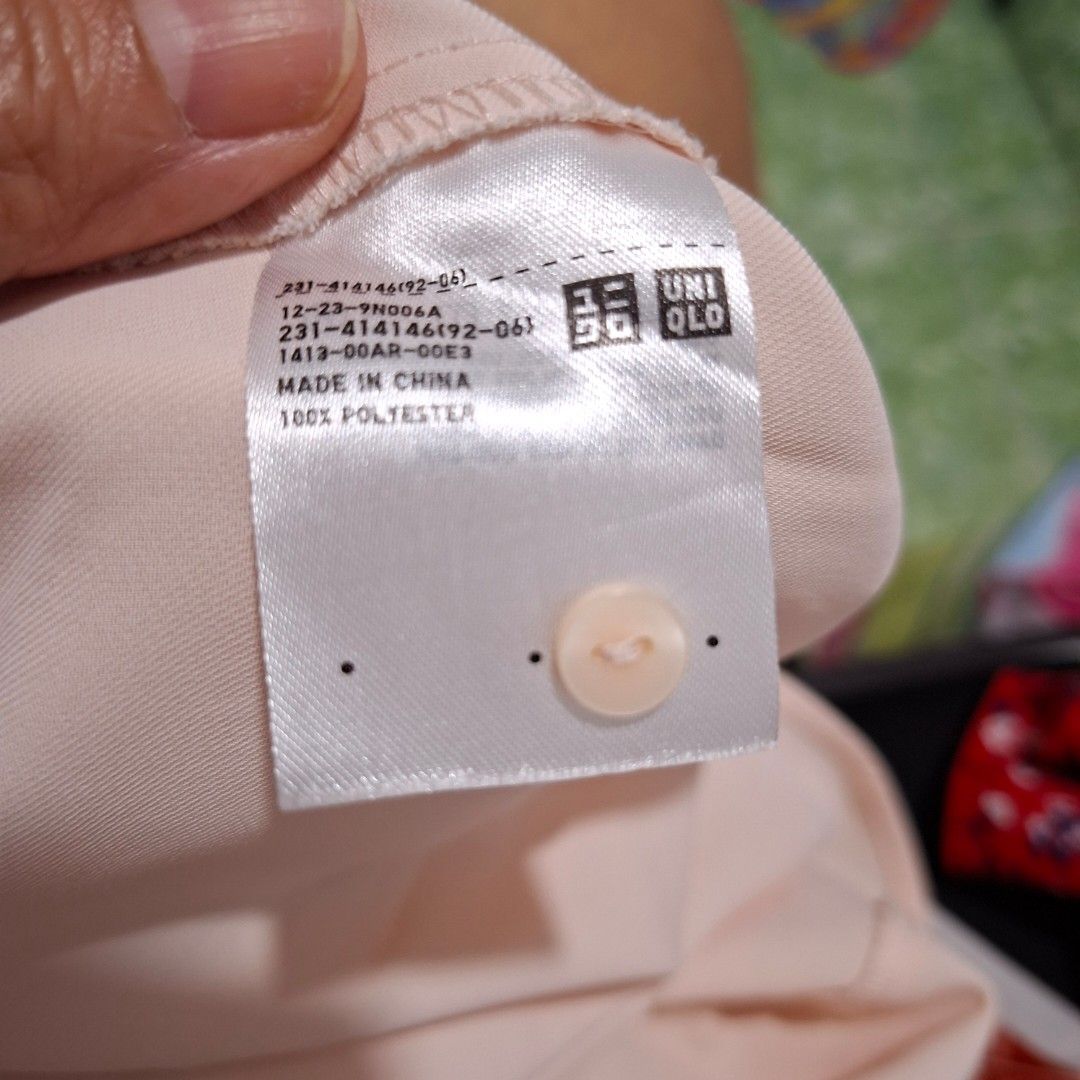 Uniqlo Pink Sleeveless Blouse Size S (Category: Sleeveless) located in Imus. Submitted by jgz21 (Listing ID 1468683045, Image 2). Description: - Brand: Uniqlo - Color: Soft Pink - Size: S (Tag attached, brand new) - Material: 100% Polyester (lightweight) - Features: Round neckline, button closure at the back collar - Condition: Clean, closet clearout, ready to wear.