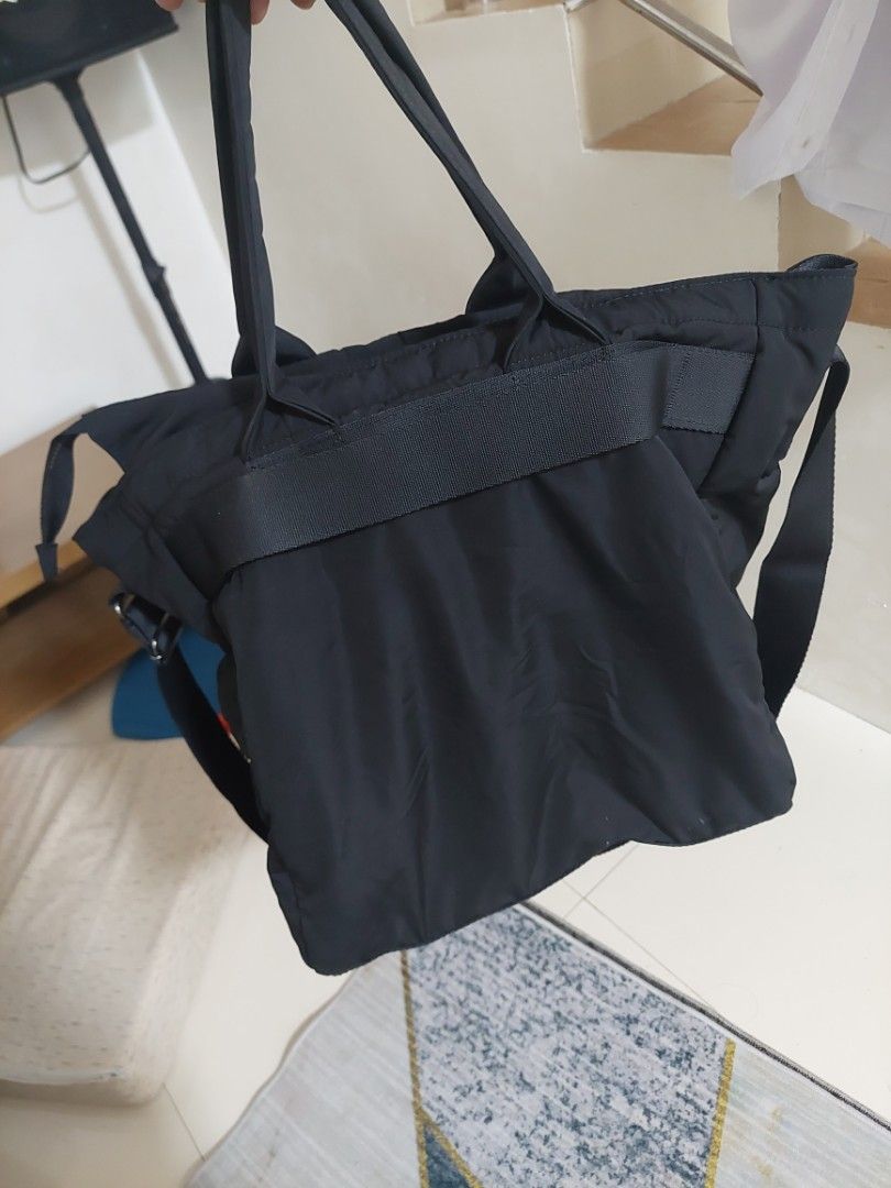 Uniqlo Round Mini Shoulder Bag Black (Category: Shoulder Bags) located in Quezon City. Submitted by jutang21 (Listing ID 1468627036, Image 3). Description: - Brand/Model: Uniqlo Puffy Shoulder Bag - Color: Classic Black - Material: Lightweight and durable quilted nylon - Closure: Secure zip top - Storage: Convenient inside pockets for keys and phone - Versatility: Adjustable strap for shoulder or crossbody wear - Ideal for: Daily errands and casu