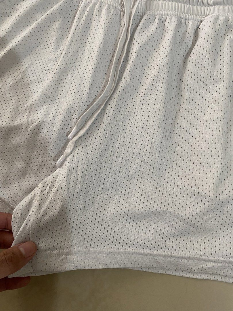 (UNISEX) ATHLETIC WORKS WHITE MESH SHORT (Category: Shorts) located in Talisay. Submitted by hustlethrift_2600 (Listing ID 1468511173, Image 3). Description: (UNISEX) ATHLETIC WORKS WHITE MESH SHORT 8-10 YRS OLD YOUTH SIZE BUT CAN FIT TO ADULT 26-32 W 14 L EXCELLENT CONDITION (AS NEW) 9.9/10 COLOR RATE QUICK DRY DOUBLE LINING BREATHABLE NO ISSUE.