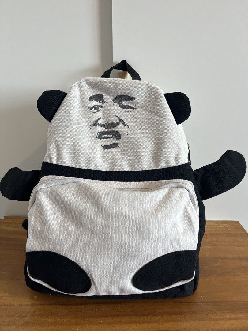 Unisex Panda Face Canvas Backpack Black and White (Category: Backpacks) located in Mandaluyong City. Submitted by unomarcelo001 (Listing ID 1468538271, Image 1). Description: price still negotiable - Adorable black and white panda canvas design with printed face graphic on the front flap - Extra storage front zippered pocket for small essentials - Sturdy black shoulder straps with adjustable plastic buckles for a comfy fit - Convenient top grab h