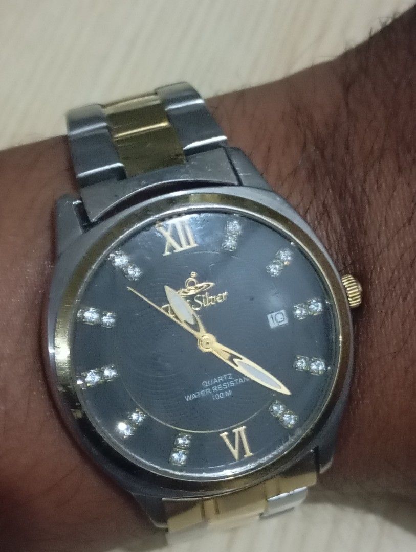 Unisilver (Category: Men's Watches) located in Las Pinas. Submitted by quick_deals_great_finds2 (Listing ID 1468653679, Image 3). Description: Original good working condition Quartz with battery 40mm Fits wrist size 7 inches.
