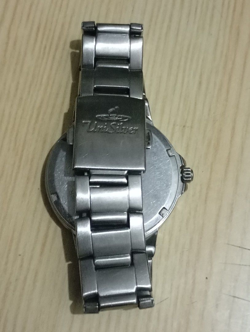 Unisilver (Category: Men's Watches) located in Las Pinas. Submitted by quick_deals_great_finds2 (Listing ID 1468658908, Image 3). Description: Original good working condition Quartz with battery 40mm Fits wrist 7 inches.