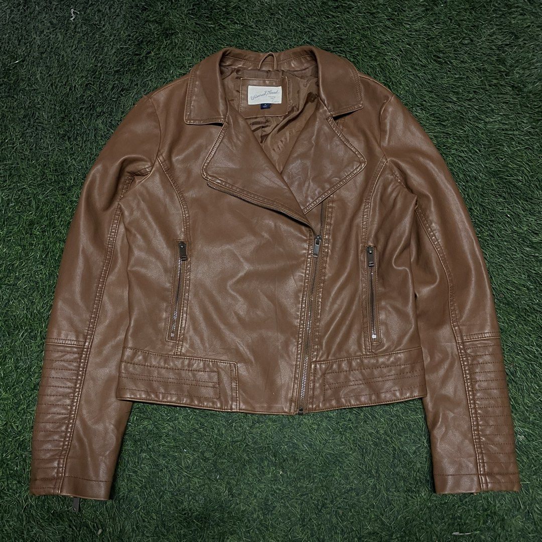 Universal Thread Faux Leather Biker Moto Jacket (Category: Coats, Jackets and Outerwear) located in Pasig City. Submitted by icie_finds (Listing ID 1468624458, Image 1). Description: Universal Thread Faux Leather Biker Moto Jacket SIZE: Tagged S (Fits Small) DIMES: Width: 20 inches Length: 21.5 inches Style: Classic asymmetrical zip faux leather biker jacket with zippered side pockets and ribbed sleeve details. Color: Cognac Brown / Caramel Measu