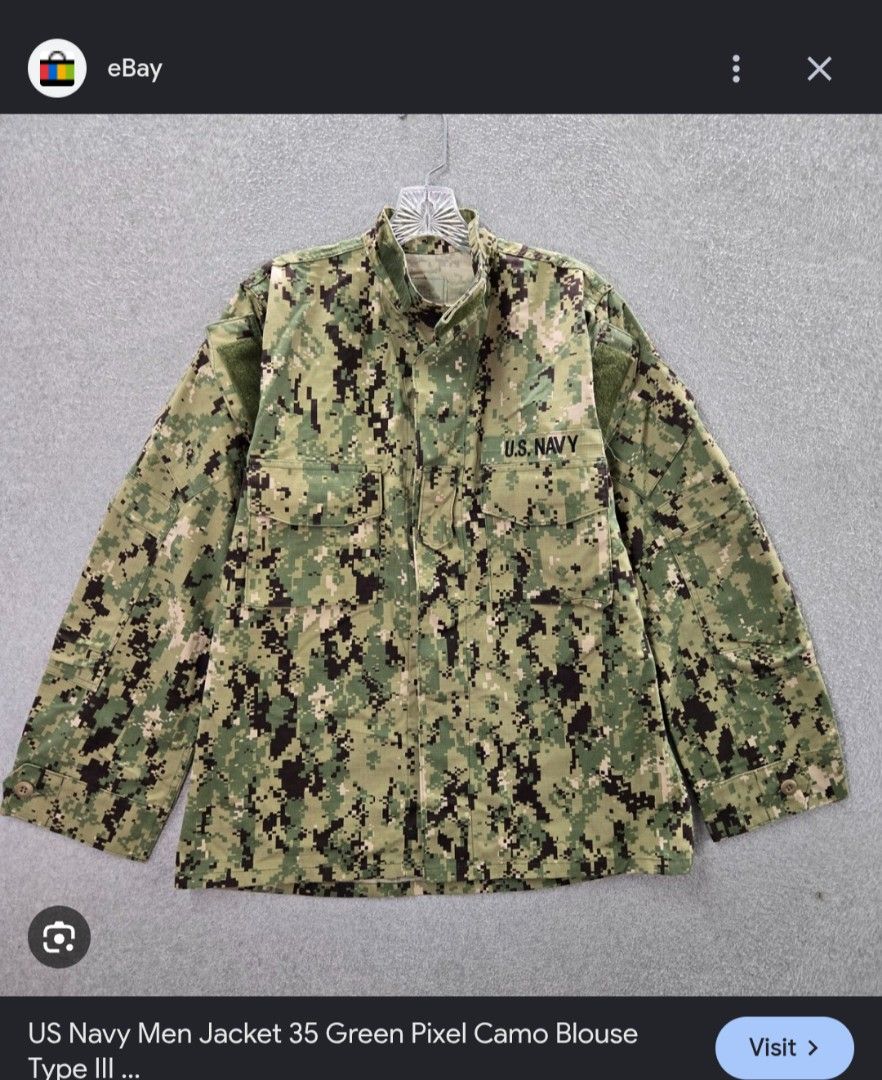US Navy Type III Green Pixel Camo Working Uniform Blouse (Category: Coats, Jackets and Outerwear) located in Imus. Submitted by darylg88358770 (Listing ID 1468632787, Image 1). Description: - Authentic US Navy Working Uniform (NWU Type III) - Green pixel camouflage pattern - Size: Small-Regular (Chest: 33-37", Height: 67-71") - Material: 50% nylon, 50% cotton ripstop - Features: Button-up front, chest pockets, embroidered U.S. Navy lettering, and
