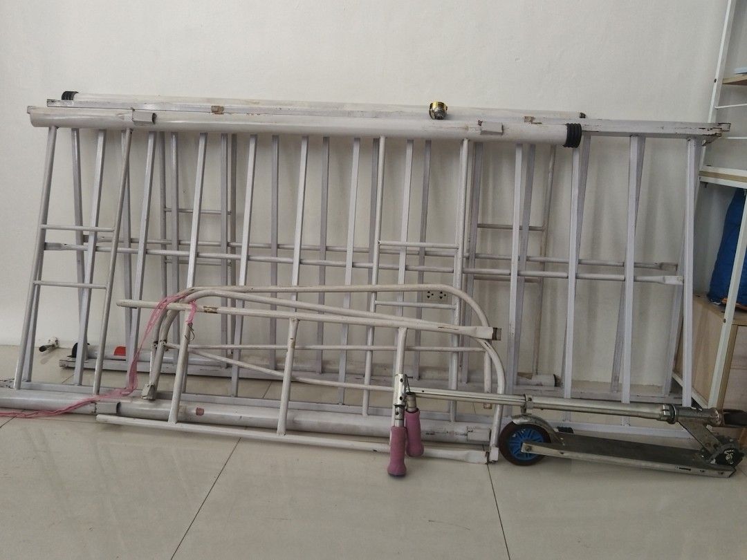 Used White Metal Bunkbed (Category: Bed Frames & Mattresses) located in Caloocan City. Submitted by freerabbit.2292f7 (Listing ID 1468516639, Image 1). Description: - Bundle includes multiple white metal bed frames, side guard pieces - Shows minor paint chipping and wear marks on the metal frames from previous use - price is negotiable.