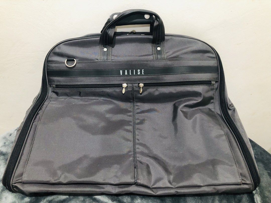 VALISE BY ACE GARMENT BAG (Category: Shoulder Bags) located in Imus. Submitted by dhouseoftotes (Listing ID 1468633274, Image 1). Description: 📐 MEASUREMENTS‼️ H - 21 inches W - 39 inches D - 3.5 inches WHEN FOLD FROM JAPAN! HEAVY DUTY MATERIAL GOOD AS NEW WITH SLING COMPLETE INCLUSION 1- ZIPPER COMPARTMENT (BACK) 2- ZIPPER COMPARTMENT (FRONT) 2- POCKETS INSIDE DISCLAIMER!! I am not affiliated, associated, authorised, endorsed by, or in any way 