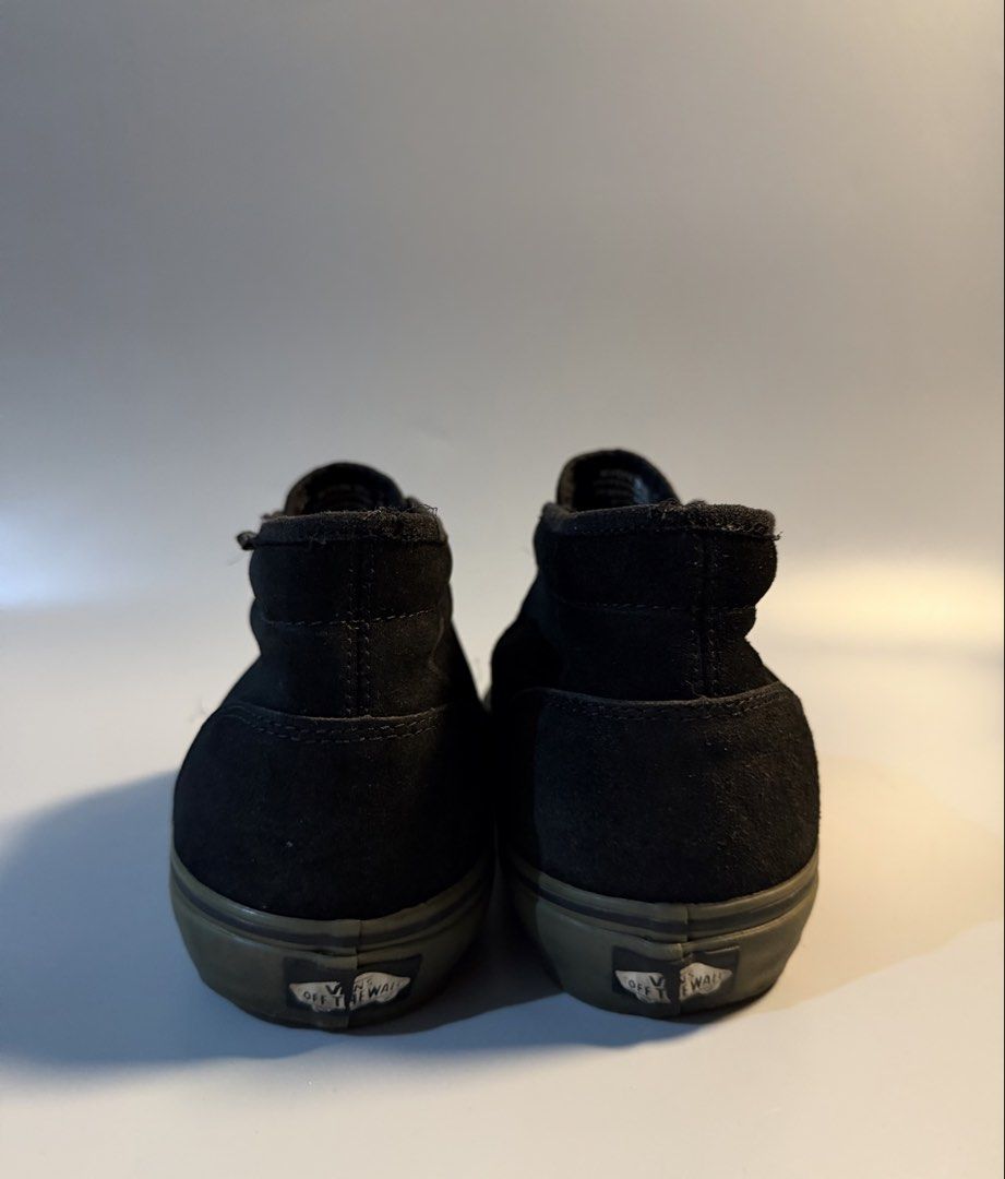 Vans Chukka Low Pro Classics Black Olive Men's 9.5 (Category: Sneakers) located in Caloocan City. Submitted by maempenafi21452 (Listing ID 1468657623, Image 3). Description: - Brand/Model: Vans Chukka Low Pro skate shoes - Colorway: Black suede upper, olive green midsole, gum waffle outsole - Size: Men's US 9.5 - Features: Mid-top silhouette, metal eyelets, comfortable fit - Condition: Minor wear on collar lining, tread is in great shape.