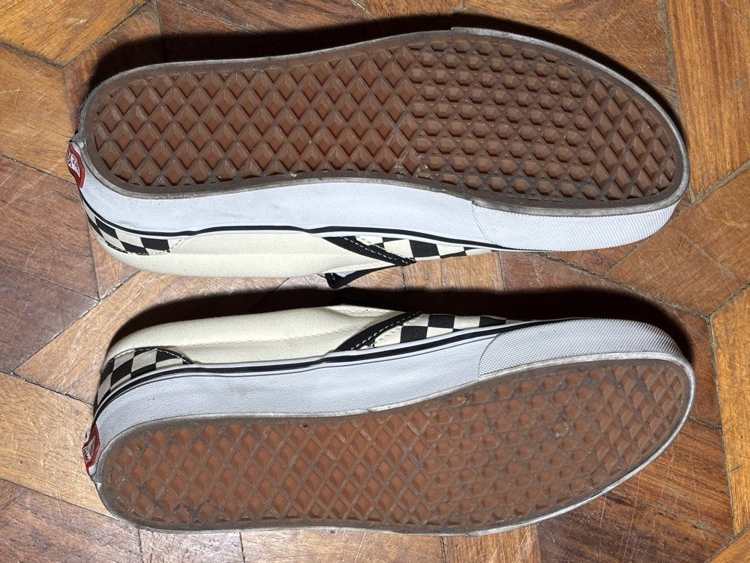 Vans Classic Checkerboard Slip-On (Category: Casual Shoes) located in San Juan City. Submitted by ecerrer (Listing ID 1468626983, Image 2). Description: - Iconic black and white checkerboard canvas upper - Classic slip-on design with elastic side accents for easy wear - Signature brown waffle rubber outsoles and white sidewalls with black pinstripe - Vans logo tags on the side and heel with clean white branded insoles - Condition: Pre-loved/Good,