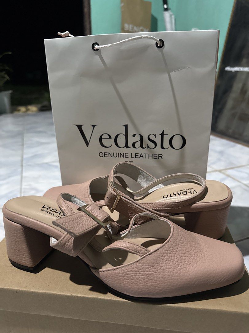 Vedasto Genuine Leather Pink Block Heels (Category: Heels) located in Balaoan. Submitted by rubyang_13 (Listing ID 1468609513, Image 1). Description: - Brand: Vedasto - Material: Pink genuine leather - Design: Closed square toe with ankle strap and buckle closure - Heel: Comfortable chunky heel for easy walking. Very comfortable to wear and walk. - Condition: Clean branded insoles and outsoles - Inclusions: Original dust bag and shoe box included