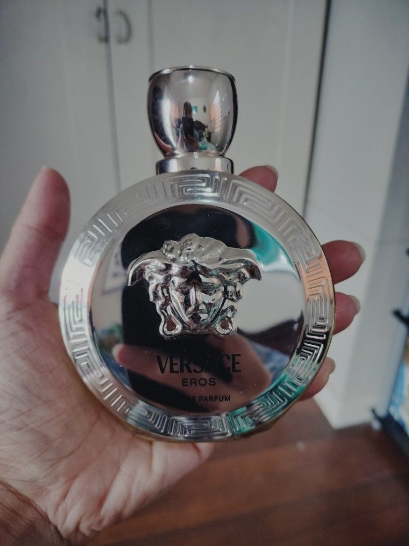 Versace Eros Eau De Parfum 100ml (Category: Fragrance & Deodorants) located in Cebu City. Submitted by mutya28.cebu (Listing ID 1468535014, Image 1). Description: - 100℅ Authentic Versace Eros Eau De Parfum - Generous 100ml / 3.4 US fl oz bottle - Features iconic Medusa head logo and elegant gold fragrance liquid - Premium silver cap with detailed Greek key border - Perfect for daily wear or gifting - NO BOX -EU DE PERFUME it was a gift for me -p