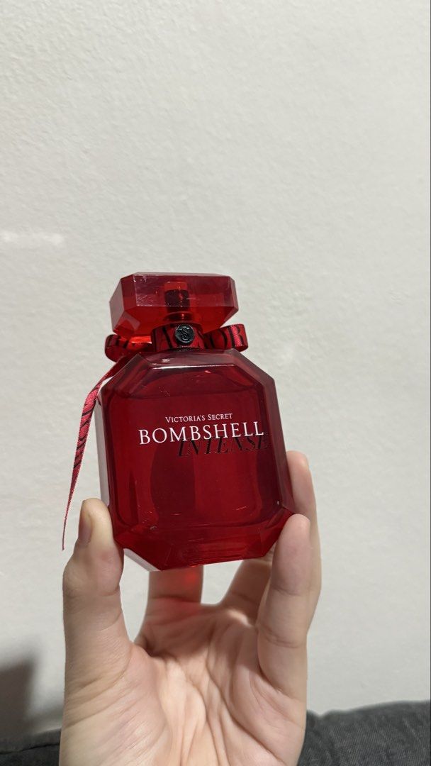 Victoria's Secret Bombshell Intense Eau de Parfum - RED (Category: Fragrance & Deodorants) located in Manila. Submitted by pheta (Listing ID 1468549512, Image 1). Description: - Brand: Victoria's Secret - Fragrance: Bombshell Intense - Scent Profile: Rich floral and fruity - Bottle Design: Red glass bottle with matching neck ribbon and spray nozzle - Inclusions: Bottle only (No box) - Condition: As seen in pictures, well-maintained.