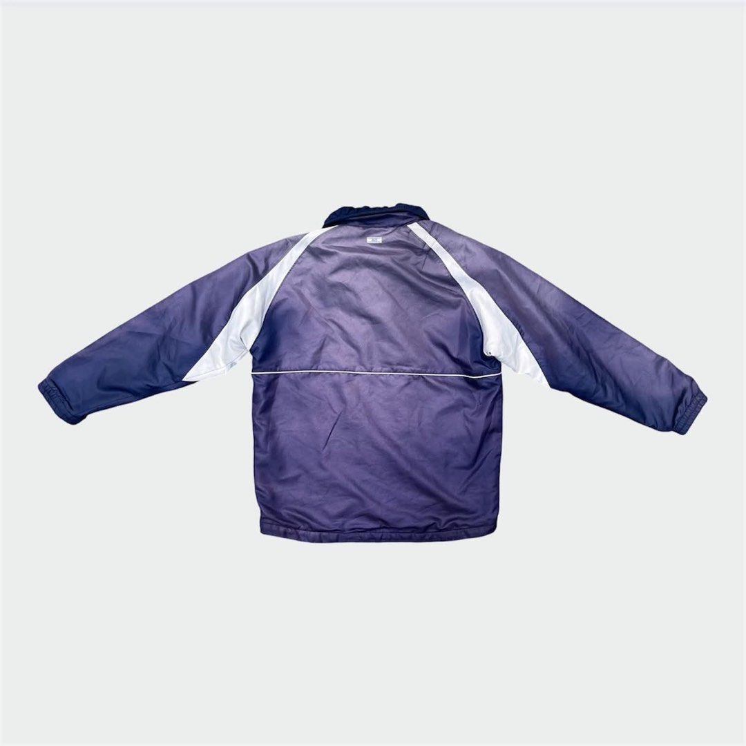 Vintage Asics (Category: Activewear) located in Calamba. Submitted by juan_jawnz (Listing ID 1468626383, Image 2). Description: Vintage Asics Track Jacket Navy / faded blue gradient with white raglan panels/ Cotton collar. Beautiful sun fade that really shows its vintage condition. PHP 650 Length- 27F, 28B inches Width- 22.5 inches Shoulder- 21 inches Sleeve- 23.5 inches Issues: One lost zipper tooth by top part, but can still fully zip up. Pin h