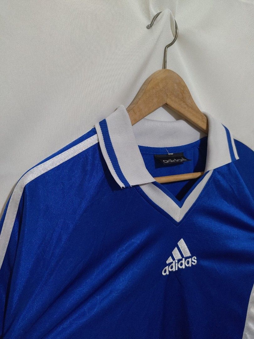 Vintage Bootleg Adidas Jersey (Category: Tshirts & Polo Shirts ) located in Bacolod City. Submitted by xvespe (Listing ID 1468692495, Image 3). Description: Size: XL Condition: Heavily Used Flaw: SOA, Black Stain behind Neck, Loose stitch/runs Width: 23.5" Length: 29.5" Color may vary due to lighting. Measurements were taken pit to pit in a flat-lay position. Please compare to your already owned garments to avoid confusion and further hassle..