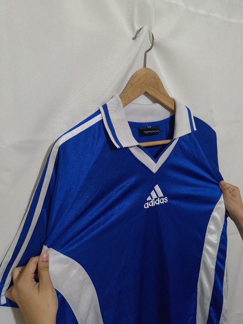 Vintage Bootleg Adidas Jersey (Category: Tshirts & Polo Shirts ) located in Bacolod City. Submitted by xvespe (Listing ID 1468692495, Image 2). Description: Size: XL Condition: Heavily Used Flaw: SOA, Black Stain behind Neck, Loose stitch/runs Width: 23.5" Length: 29.5" Color may vary due to lighting. Measurements were taken pit to pit in a flat-lay position. Please compare to your already owned garments to avoid confusion and further hassle..