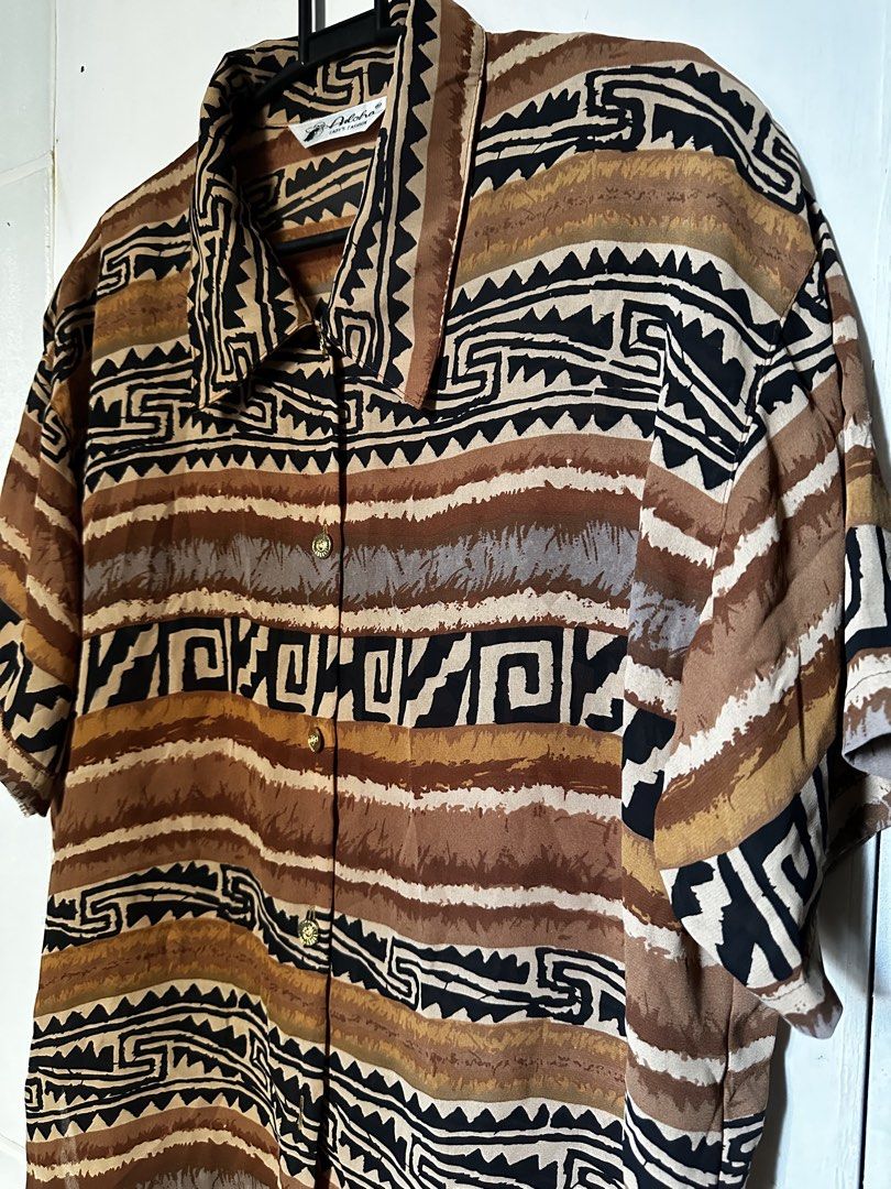 Vintage brown aztec patern button down shirt (Category: Blouses) located in Cavite. Submitted by chicfinds.slay (Listing ID 1468577041, Image 3). Description: ✨vintsge type shirt ✨no flaws ✨relaxed fit(bagsak tela) ✨airy & flowy texture ✨ best for beach ootd ✨ unisex .