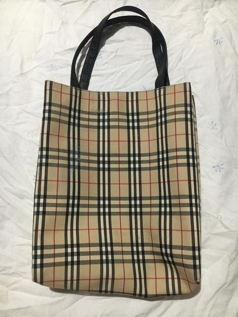 vintage Burberry Nova Check tote bag (Category: Tote Bags) located in Quezon City. Submitted by thriftyzx (Listing ID 1468675567, Image 2). Description: vintage Burberry Nova Check tote bag Condition: 9.5/10 Need wash Excellent Condition issue See the last 2 pics 1399+SF Location: QC.