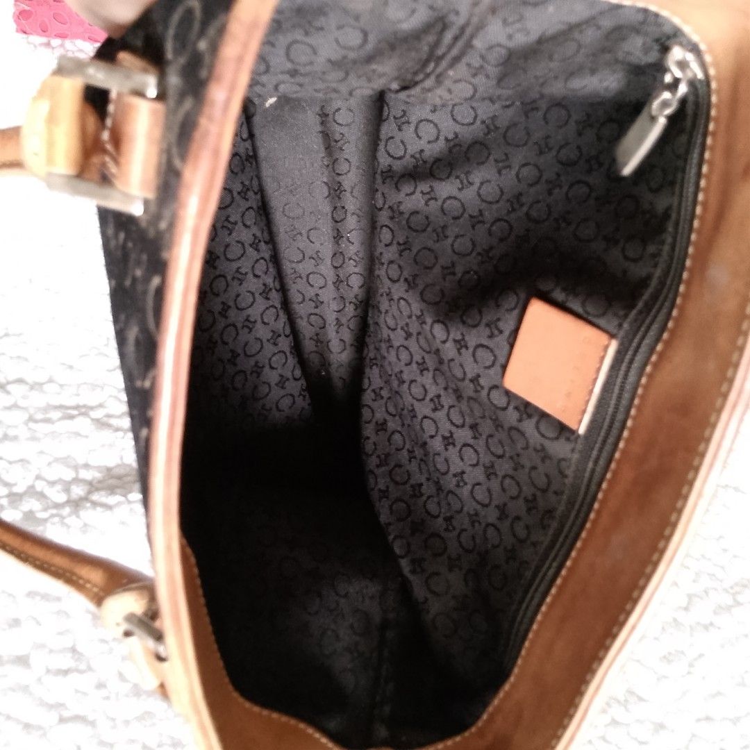 Vintage Celine C Macadam Monogram Suede Tote Bag (Category: Tote Bags) located in Tuguegarao City. Submitted by thriftedtreasures101.1 (Listing ID 1468561678, Image 3). Description: Vintage, authentic Celine C Macadam Suede Monogram Tote Bag from the 1990s. It is crafted from a soft, laser-debossed black suede body contrasted by smooth, structured tan leather handles and matching anchor tabs. Slightly used, in good condition with small flaws as s