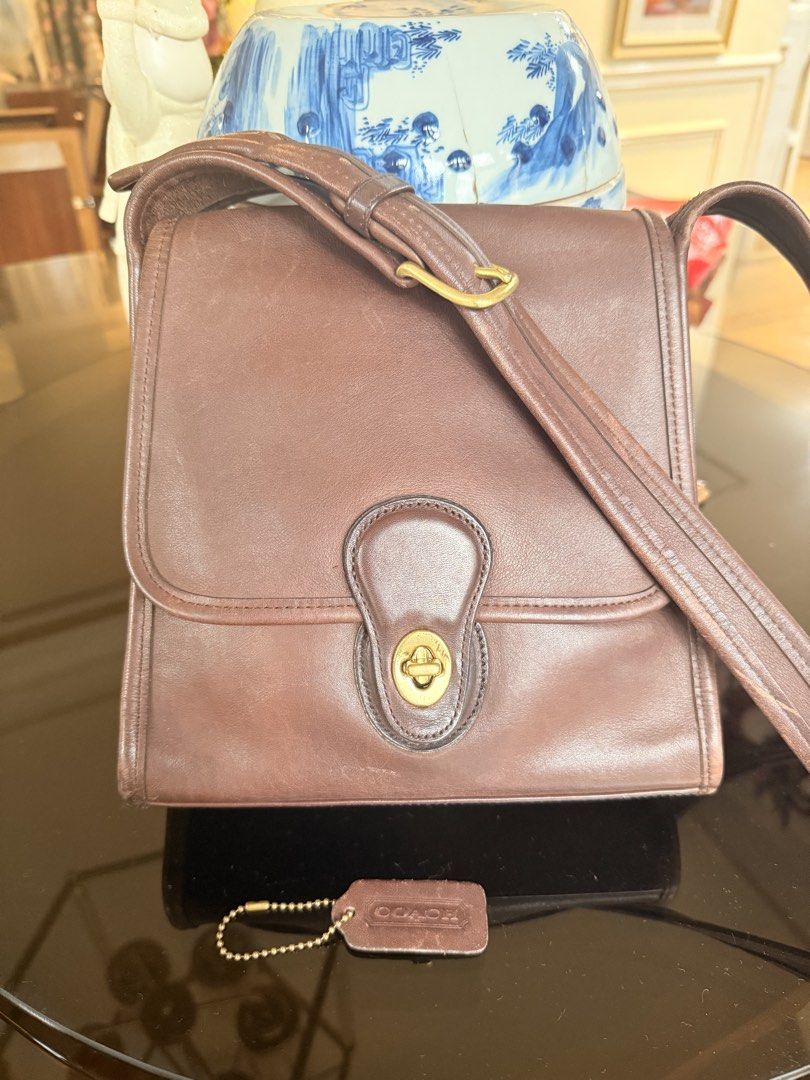 Vintage Coach (Category: Luxury Bags & Wallets) located in Taguig. Submitted by gwenls (Listing ID 1468560385, Image 1). Description: 💯 Authentic Vintage Coach 🤎 Shelburne Flap No.9038 in Mahogany 🤎 Rare bag made only in 1998 Approx 8 • 9 • 2 inches Leather needs more conditioning No tears, no rips, no molds.