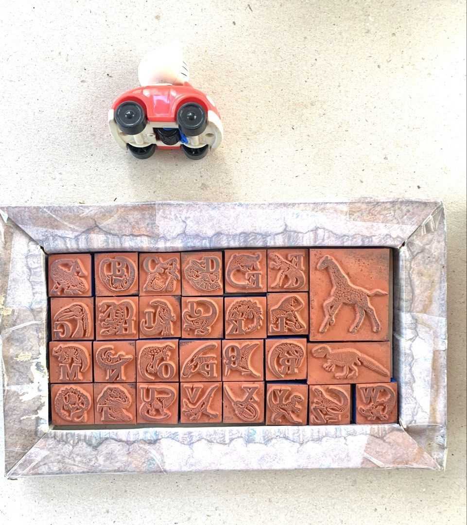 Vintage Dinobet Rubber Stamp Alphabet Set (Category: Craft Supplies & Tools) located in Mandaue City. Submitted by maxguiller89260 (Listing ID 1468551464, Image 3). Description: 1992 Rubber Stampede Dinobet alphabet stamp set Includes 26 stamps featuring unique dinosaurs,giraffe and dino blank Box is beat up manageable NY sourced 20 yrs back Washable ink pad missing . Stamp set complete Hello Kitty Rolling Stamp Happy Meal. 9x14 npouch LBC NCR no