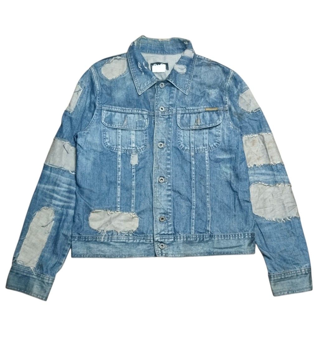 Vintage Dolce & Gabbana AW04 Reconstructed / Patchwork Denim Jacket (Category: Coats, Jackets and Outerwear) located in Mandaue City. Submitted by chaseandchast (Listing ID 1468702061, Image 1). Description: Vintage Dolce & Gabbana AW04 Reconstructed / Patchwork Denim Jacket Large Width - 20.5 Length - 25 Excellent condition Color rate - 9.5/10 Issue - washable stains (see last pic) plus shipping fee.