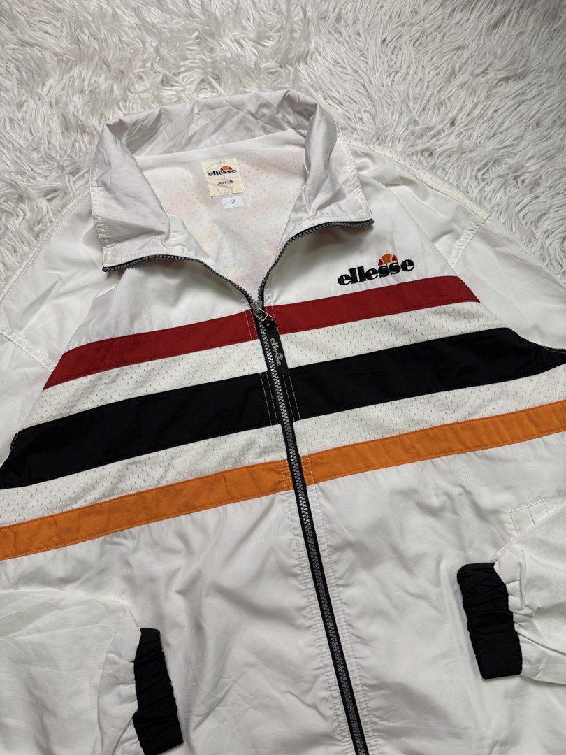 Vintage ellesse (Category: Coats, Jackets and Outerwear) located in Baguio. Submitted by sellingtonshop (Listing ID 1468524186, Image 3). Description: t13. Vintage Ellesse tricolor jacket *massive wolf playing tennis logo at the back Size: L on tag fits XL Dimes: 31*26 Condition: good as new Issue: none Mine: 980 Steal: 1080 Grab: 1180.