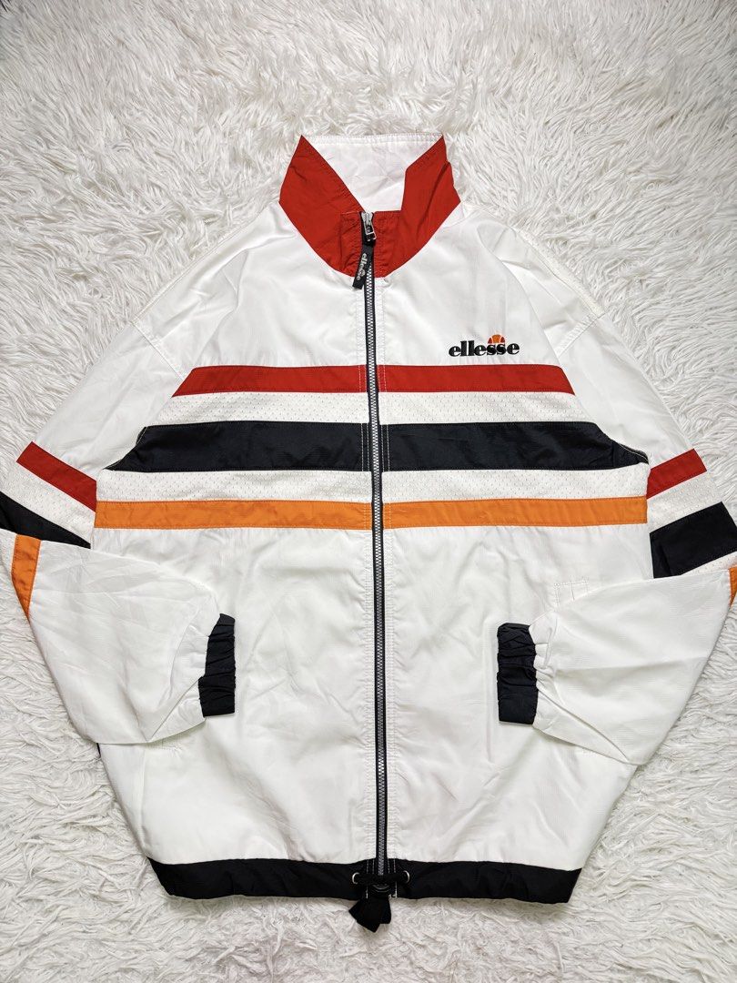 Vintage ellesse (Category: Coats, Jackets and Outerwear) located in Baguio. Submitted by sellingtonshop (Listing ID 1468524186, Image 1). Description: t13. Vintage Ellesse tricolor jacket *massive wolf playing tennis logo at the back Size: L on tag fits XL Dimes: 31*26 Condition: good as new Issue: none Mine: 980 Steal: 1080 Grab: 1180.