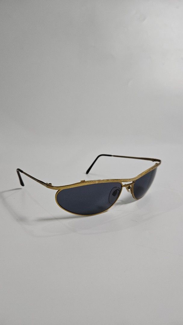Vintage Gold Aviator Sunglasses (Category: Sunglasses & Eyewear) located in Alfonso. Submitted by jbcamet (Listing ID 1468652286, Image 1). Description: - Style: Classic pilot aviator with a double nose bridge - Frame: Lightweight gold-tone metal with black acetate temple tips - Lenses: Dark tinted for ultimate sun protection - Fit: Intact, adjustable nose pads for all-day comfort - Condition: Brand new / Excellent, great everyday accessory - Mee