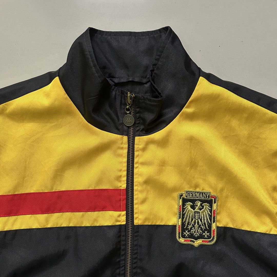 Vintage Kappa Germany Track Jacket (Category: Coats, Jackets and Outerwear) located in Cebu City. Submitted by jeen.yuhs (Listing ID 1468577149, Image 2). Description: Vintage Kappa Tag Large (22/26) Perfect Fit. Pristine Condition Germany Theme Interior printed lining Kappa & Germany Logo Embroidered .