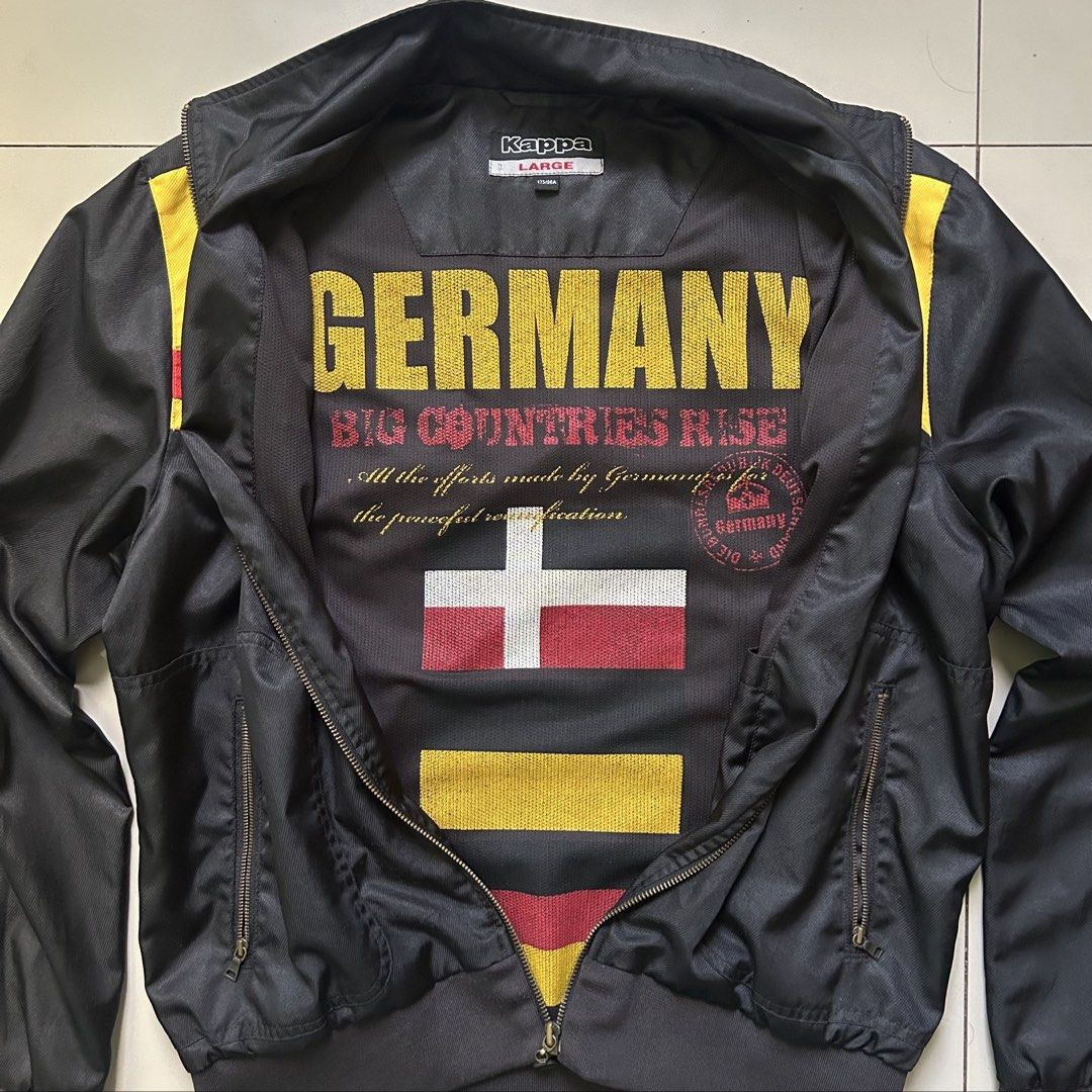 Vintage Kappa Germany Track Jacket (Category: Coats, Jackets and Outerwear) located in Cebu City. Submitted by jeen.yuhs (Listing ID 1468577149, Image 3). Description: Vintage Kappa Tag Large (22/26) Perfect Fit. Pristine Condition Germany Theme Interior printed lining Kappa & Germany Logo Embroidered .