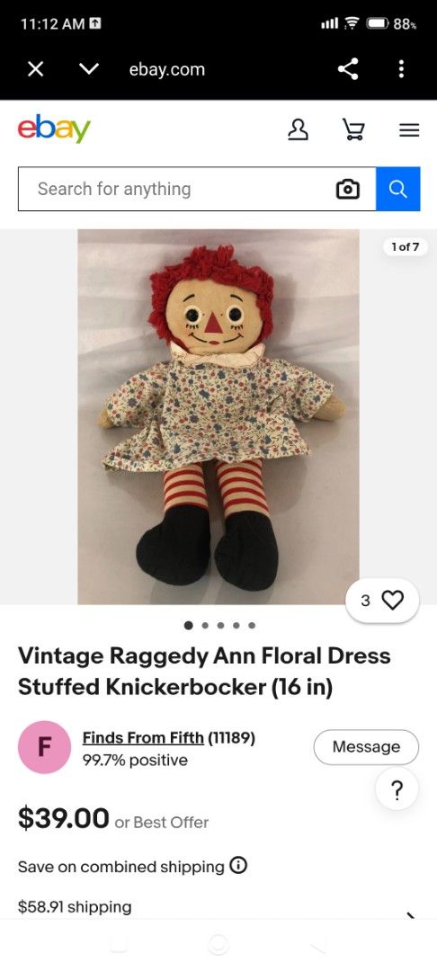 Vintage Knickerbocker Raggedy Ann Doll (Category: Babies & Kids Fashion) located in Mandaluyong City. Submitted by LEATHERFACE (Listing ID 1468549665, Image 2). Description: - Vintage Knickerbocker Raggedy Ann doll - Size: Approx. 16 inches tall - Features signature red yarn hair and embroidered facial features - Wears a charming floral dress, striped socks, and black shoes - Condition: Shows vintage wear around the face with one missing black ey