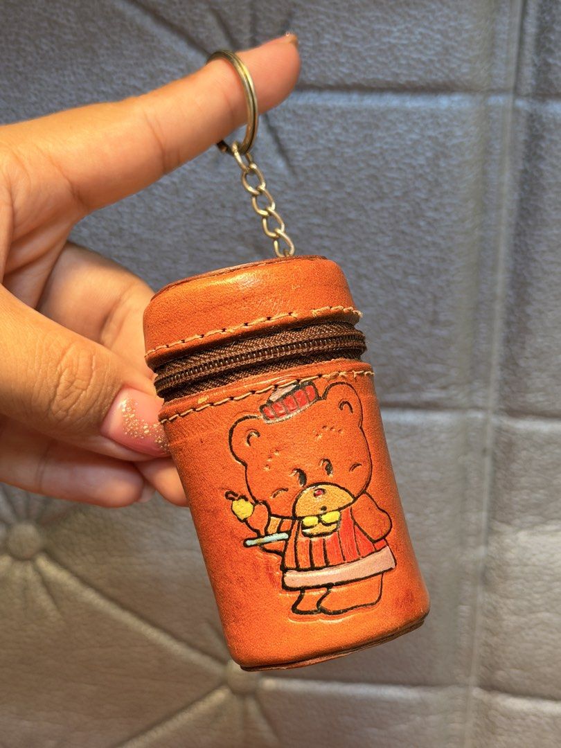 Vintage leather bear coin pouch keychain (Category: Purses & Pouches) located in Baguio. Submitted by aalkharys (Listing ID 1468677672, Image 3). Description: Super cute brown leather coin pouch featuring a cartoon bear design! Includes a top zipper and a built-in keychain. Perfect for loose change, trinkets, or earphones. Durable and brand new..