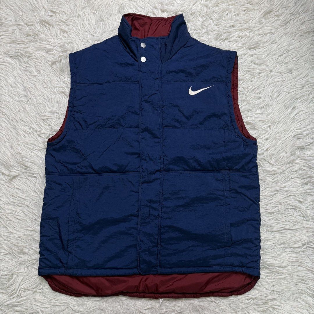 Vintage nike puffer (Category: Vests) located in Baguio. Submitted by sellingtonshop (Listing ID 1468519165, Image 1). Description: t7. vintage nike puffer vest Size: L Dimes: 26*23.5 Condition: very good Issue: washable dirt at the back Mine: 780 Steal: 880 Grab: 980.