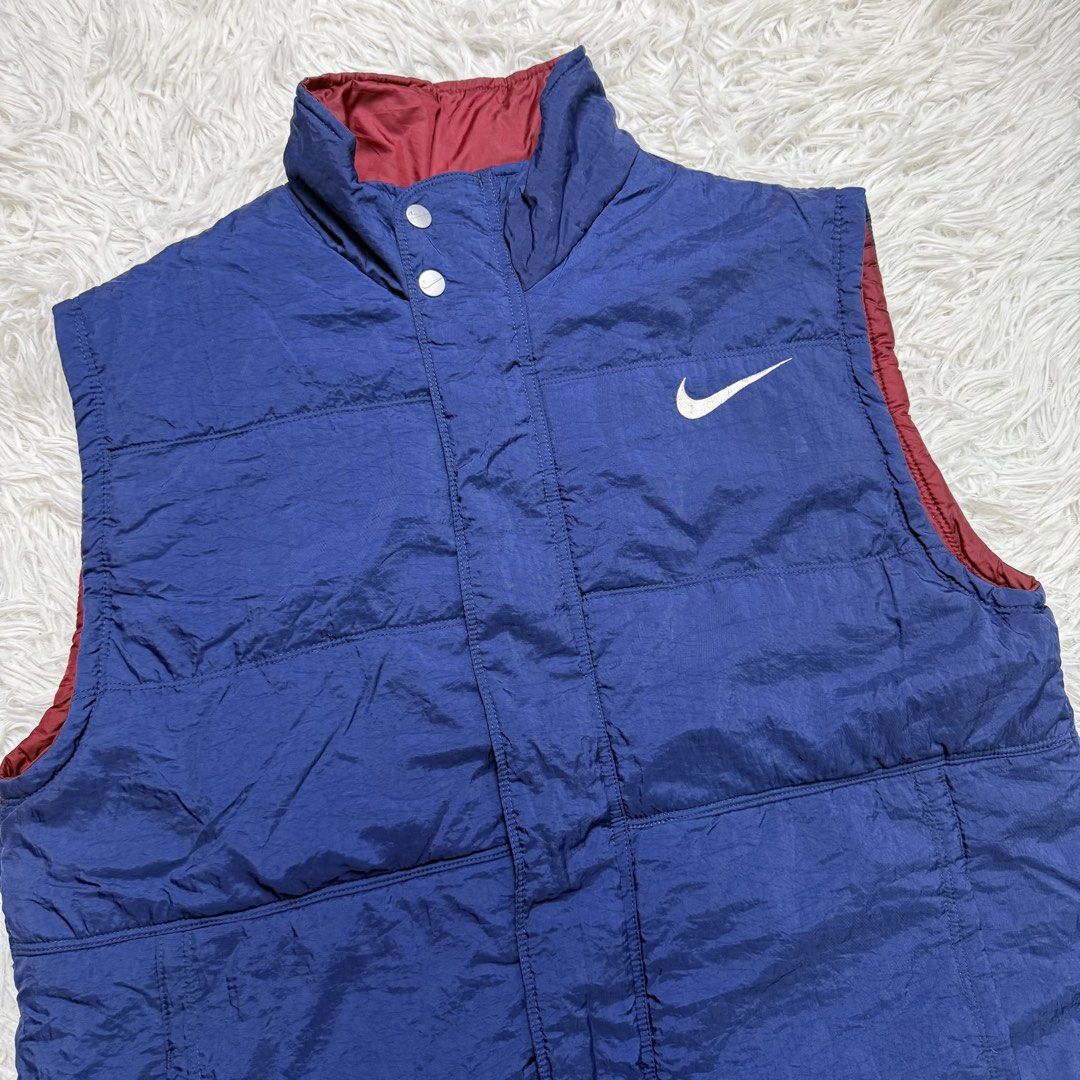 Vintage nike puffer (Category: Vests) located in Baguio. Submitted by sellingtonshop (Listing ID 1468519165, Image 3). Description: t7. vintage nike puffer vest Size: L Dimes: 26*23.5 Condition: very good Issue: washable dirt at the back Mine: 780 Steal: 880 Grab: 980.