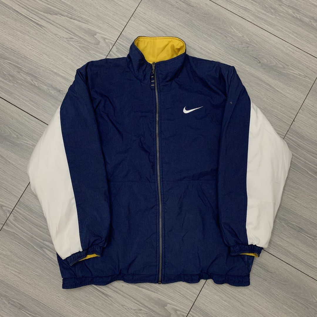 Vintage Nike Reversible Puffer Jacket (Category: Coats, Jackets and Outerwear) located in Manila. Submitted by arxxxm (Listing ID 1468682361, Image 1). Description: Vintage Nike Reversible Puffer Jacket 23" width 27" length Excellent condition reversible puffer jacket 2000 + sf 📥.