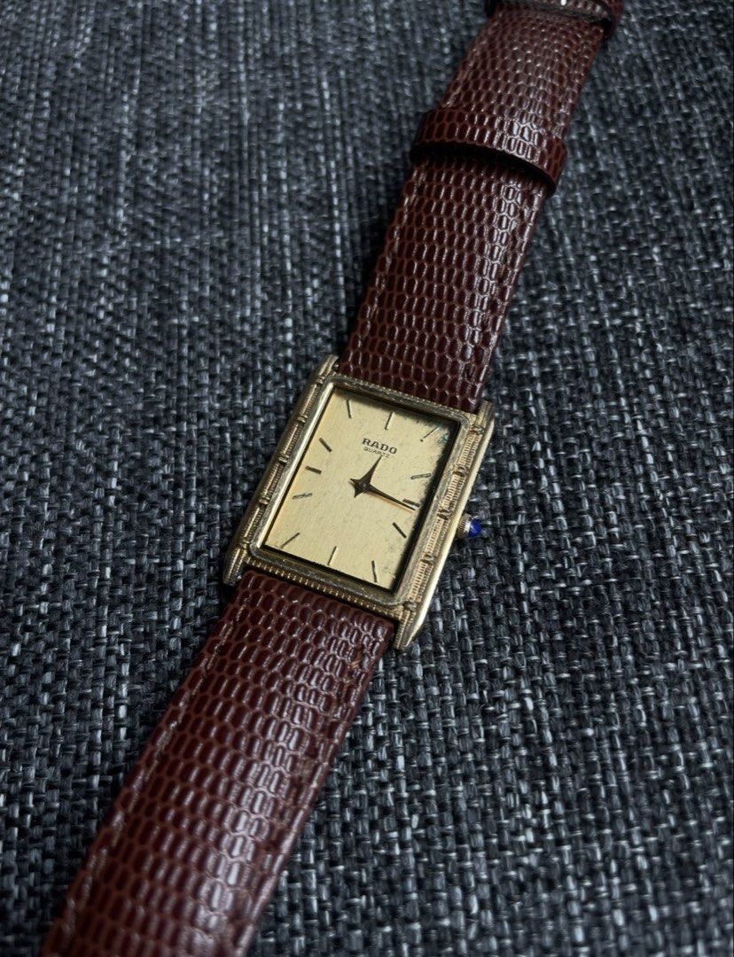 Vintage Rado Quartz Gold Rectangular Dial Watch (Category: Luxury Watches) located in Antipolo. Submitted by ac5555 (Listing ID 1468561001, Image 2). Description: RARE Vintage Rado Tank Braided case 29mm Patina on dial Ref 121.9027.2 NO RESERVE.