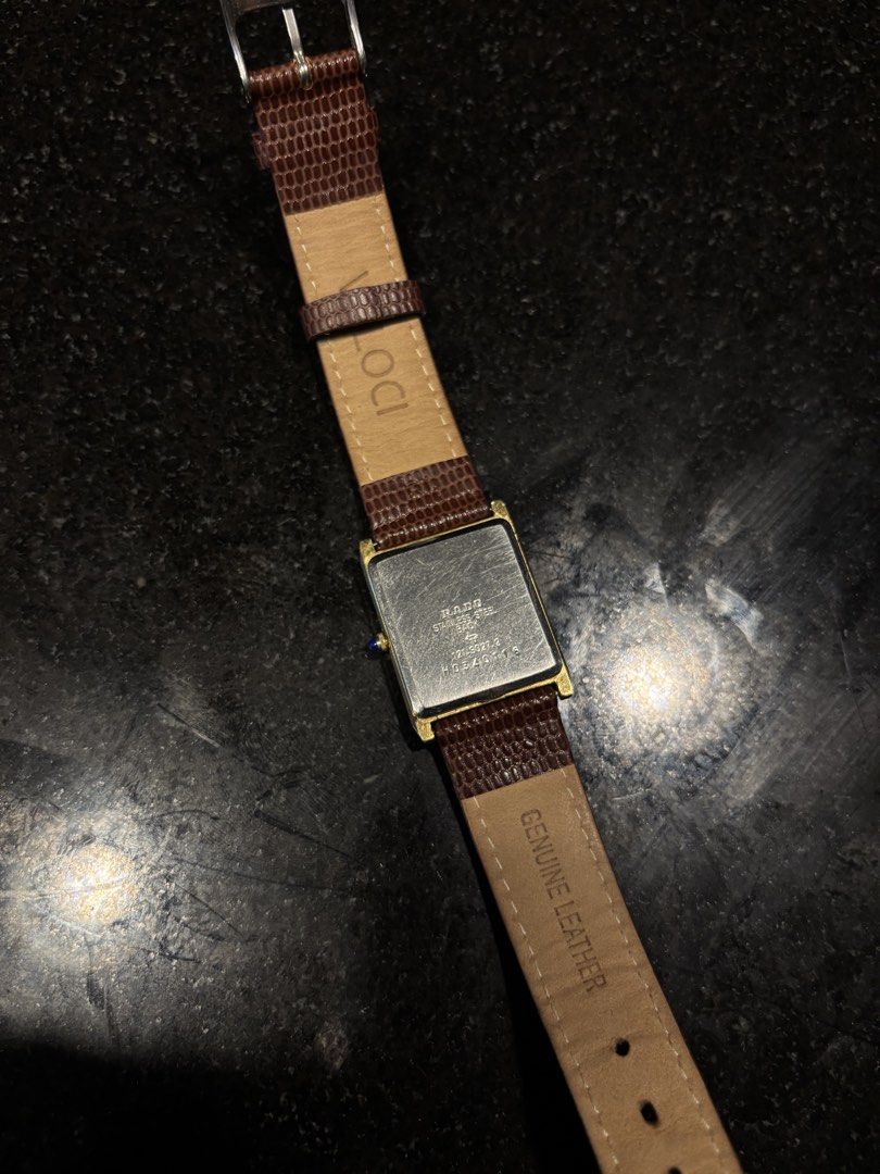 Vintage Rado Quartz Gold Rectangular Dial Watch (Category: Luxury Watches) located in Antipolo. Submitted by ac5555 (Listing ID 1468561001, Image 3). Description: RARE Vintage Rado Tank Braided case 29mm Patina on dial Ref 121.9027.2 NO RESERVE.