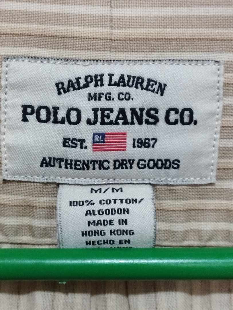 Vintage Ralph Lauren Button Down Shirt (Category: Tshirts & Polo Shirts ) located in San Fernando. Submitted by nerosales (Listing ID 1468505897, Image 2). Description: Vintage Ralph Lauren Polo Jeans Button Down Shirt width - 22 inches length 31 inches issue: very light stain sa harap, halos hindi halata (please see last photo). 400 pesos only SM City Pampanga Shipping: J&T Payment : Gcash NO COD NO COP NO WAYBILL FIRST .