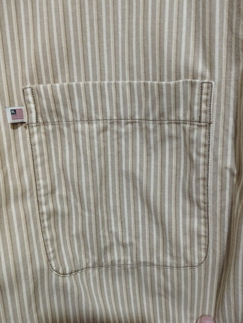 Vintage Ralph Lauren Button Down Shirt (Category: Tshirts & Polo Shirts ) located in San Fernando. Submitted by nerosales (Listing ID 1468505897, Image 3). Description: Vintage Ralph Lauren Polo Jeans Button Down Shirt width - 22 inches length 31 inches issue: very light stain sa harap, halos hindi halata (please see last photo). 400 pesos only SM City Pampanga Shipping: J&T Payment : Gcash NO COD NO COP NO WAYBILL FIRST .