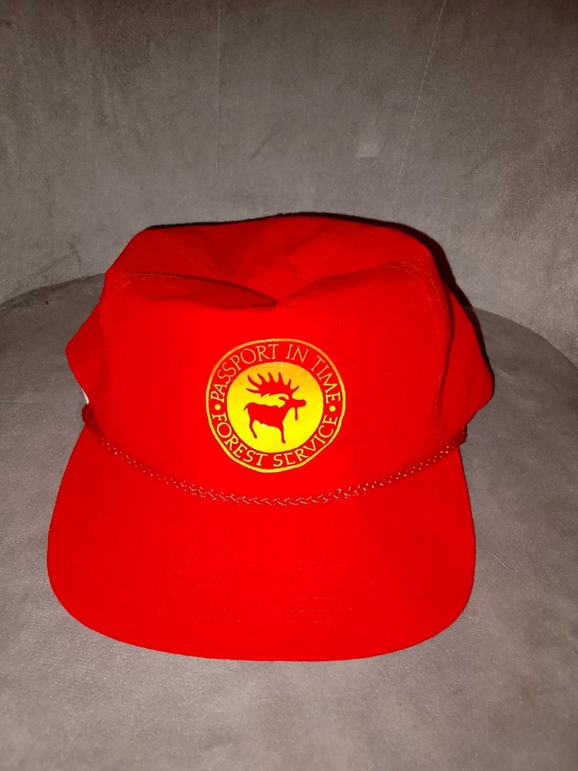 Vintage Red Forest Service Nylon Cap with Moose Logo (Category: Caps & Hats) located in Binangonan. Submitted by yuristalin888 (Listing ID 1468615429, Image 2). Description: Add a classic outdoor look to your style with this bright red vintage-inspired nylon cap featuring a yellow “Passport in Time – Forest Service” moose emblem and decorative braided rope trim. Made from 100% nylon, it has a curved brim and an adjustable snapback closure for a c