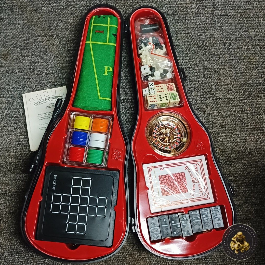 Violin-Shaped Travel Game Case (Category: Vintage Collectibles) located in Meycauayan. Submitted by ka_luma (Listing ID 1468700608, Image 1). Description: violin-shaped travel game case (often sold as a 12-in-1 casino or travel game set, such as Traveler's Games or similar novelty packs) containing a mini roulette wheel, poker chips, playing cards, dice, a solitaire/board game grid, and felt play mats.