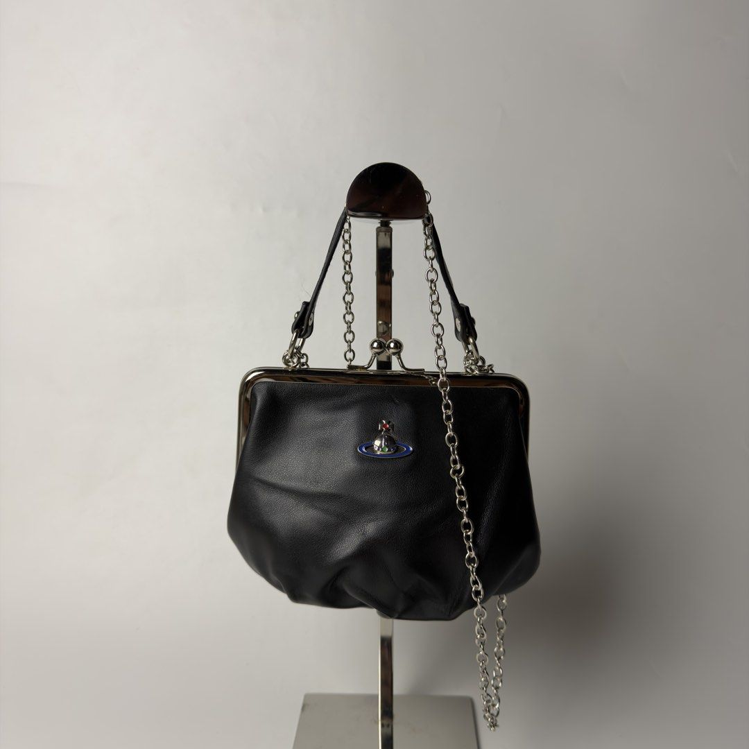 Vivienne Westwood Granny Frame Bag (Category: Purses & Pouches) located in Manila. Submitted by streetsavvy (Listing ID 1468588510, Image 1). Description: Vivienne Westwood Granny Frame Bag Width: 7” Height: 6” Depth: 2” Strap Drop: 4” Sling Drop: 20” Measured in Inches Condition: Excellent condition No flaw Made in Italy Silver Hardware .