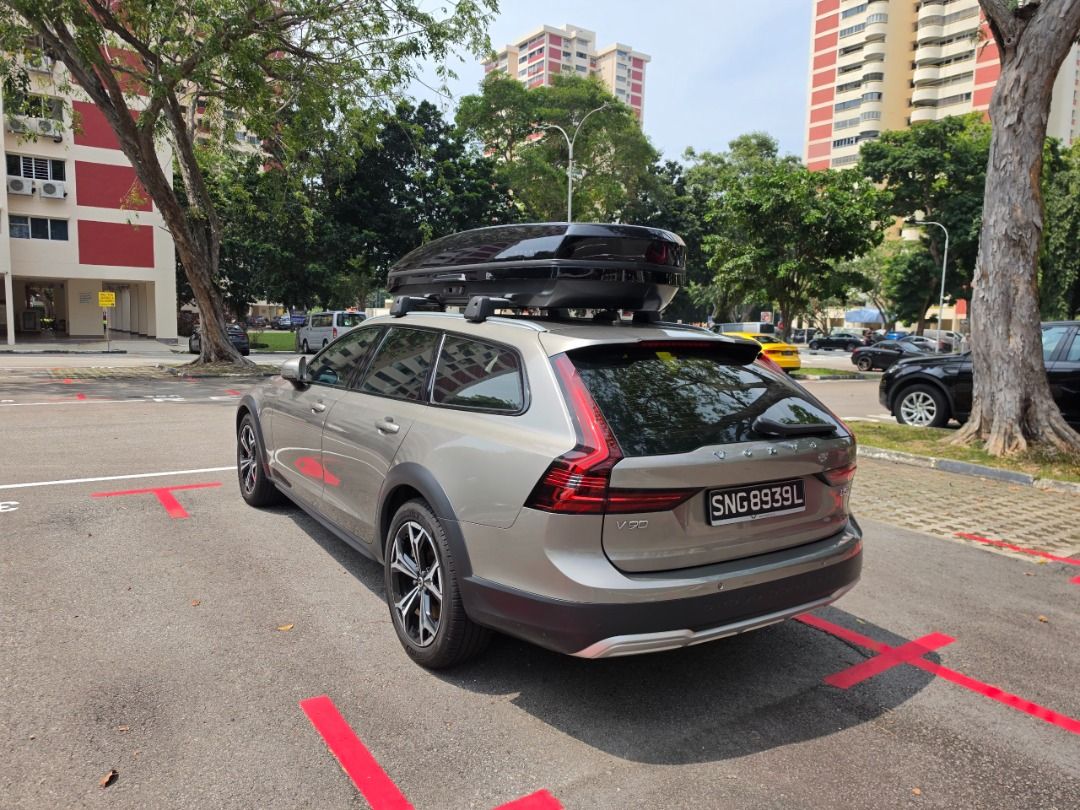 Volvo V90 Cross Country Mild Hybrid B5 (A) (Category: Used Cars) located in Singapore. Submitted by paulinliner (Listing ID 1468558914, Image 2). Description: 2.0L B5 mild hybrid, 250hp, AWD, 8-speed auto. Pilot Assist, adaptive cruise control, City Safety, 551L boot, Harman Kardon 14-speaker/600W sound. Panoramic sunroof, leather seats, power tailgate, keyless entry, roof rails, LED headlights, rear parking camera. Thule roof box included. Regis