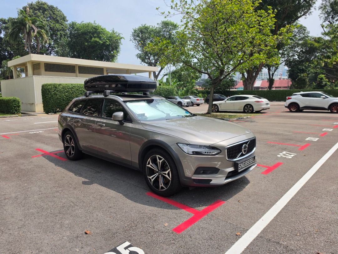 Volvo V90 Cross Country Mild Hybrid B5 (A) (Category: Used Cars) located in Singapore. Submitted by paulinliner (Listing ID 1468558914, Image 3). Description: 2.0L B5 mild hybrid, 250hp, AWD, 8-speed auto. Pilot Assist, adaptive cruise control, City Safety, 551L boot, Harman Kardon 14-speaker/600W sound. Panoramic sunroof, leather seats, power tailgate, keyless entry, roof rails, LED headlights, rear parking camera. Thule roof box included. Regis