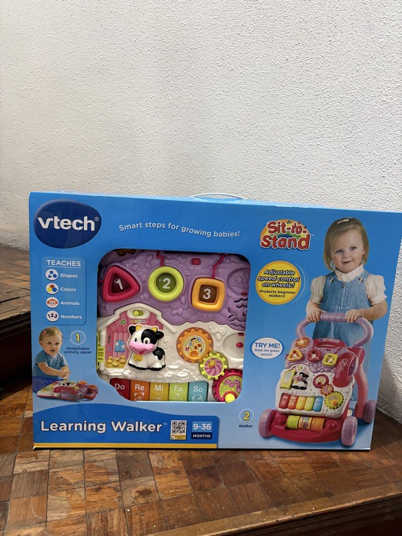 VTech Sit-to-Stand Learning Walker Pink (Category: Infant Playtime) located in Quezon City. Submitted by KRC07 (Listing ID 1468591149, Image 1). Description: - Brand: VTech Sit-to-Stand Learning Walker (Pink) - Condition: Brand new, still packed inside original box - Age Range: Suitable for babies 9 to 36 months old - Key Features: Detachable interactive play panel, piano keys, shape sorters, spinning gears, telephone handset, and glowing buttons