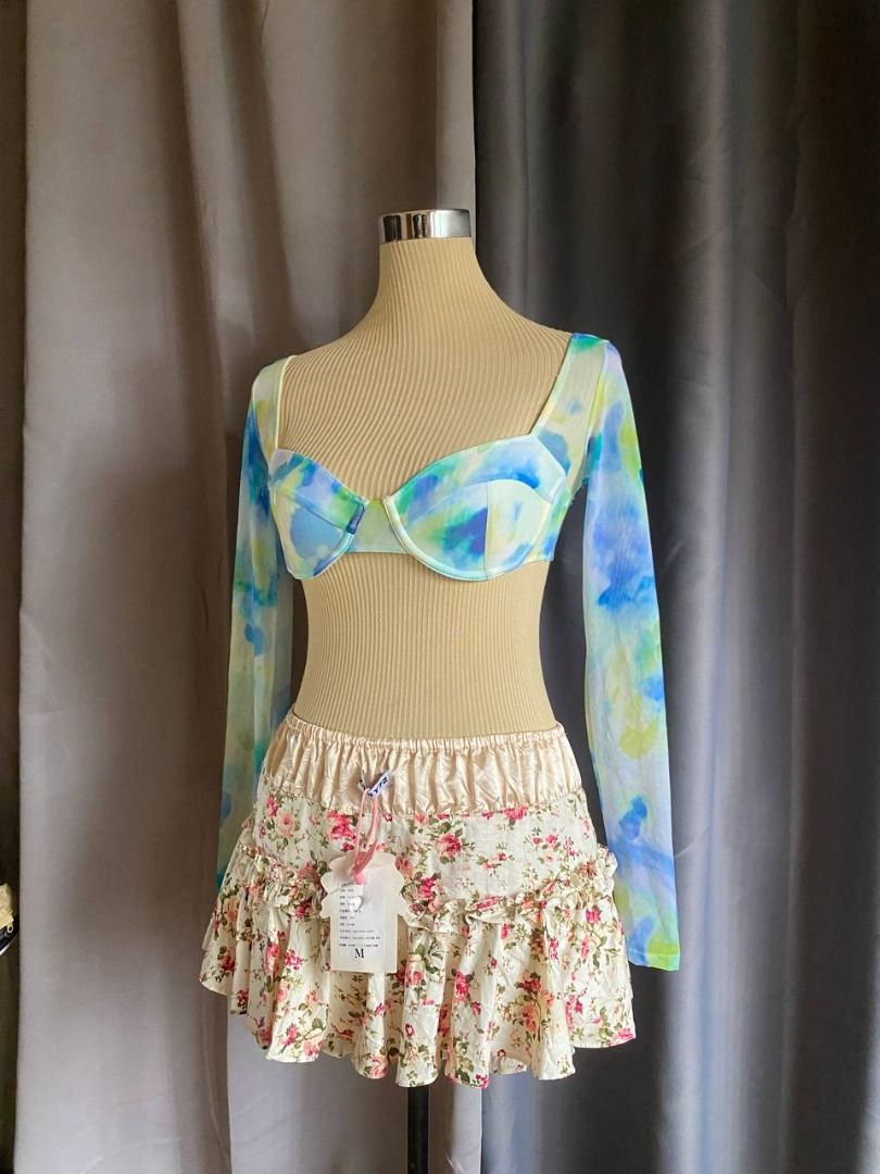 Watercolor Mesh Long Sleeve Underwire Top (Category: Sleeveless) located in Cagayan de Oro. Submitted by curated_closetph (Listing ID 1468554291, Image 2). Description: — Size: XS - S — Color: Blue / Green / Yellow — Vibrant abstract watercolor print — Structured underwired cups for lift and support — Sheer mesh long sleeves — Stretchy smocked back for a flexible, comfortable fit — Ultra-cropped hemline — Can negotiate the price — 🛒 Shop more to