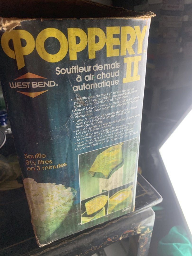 West Bend Poppery II Automatic Hot Air Corn Popper (Category: Cookware & Accessories) located in Quezon City. Submitted by sojisup (Listing ID 1468563059, Image 2). Description: - Brand/Model: West Bend Poppery II - Capacity: Pops 3.5 liters of popcorn - Speed: Ready in just 3 minutes - Healthy: 100% oil-free hot air popping - Condition: Comes in original cardboard box (bilingual English/French packaging) still in box never used .