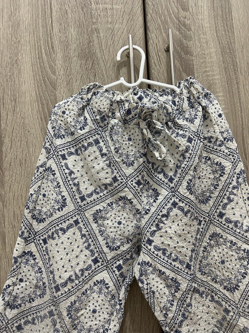 White Blue Bandana Print Square pants (Category: Babies & Kids Fashion) located in Makati City. Submitted by michellecollado07 (Listing ID 1468706141, Image 2). Description: - Trendy white and blue bandana print - Lightweight crinkled texture fabric - Comfortable elastic waistband with adjustable drawstring - Relaxed fit with a stylish cropped length - Easy to match for casual warm-weather days.